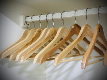 Wooden coat hangers in the wardrobe at Villa Sunrise, Flamingo Bay Villas Aruba.